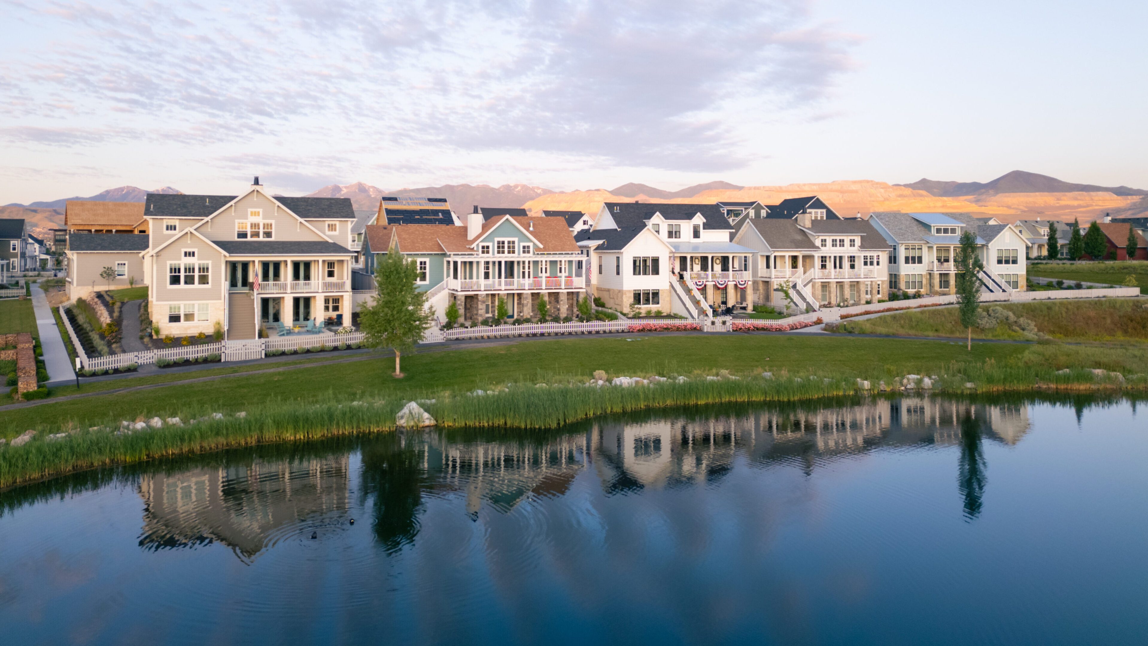 Establishing aerial view of lakefront homes in Utah, USA.