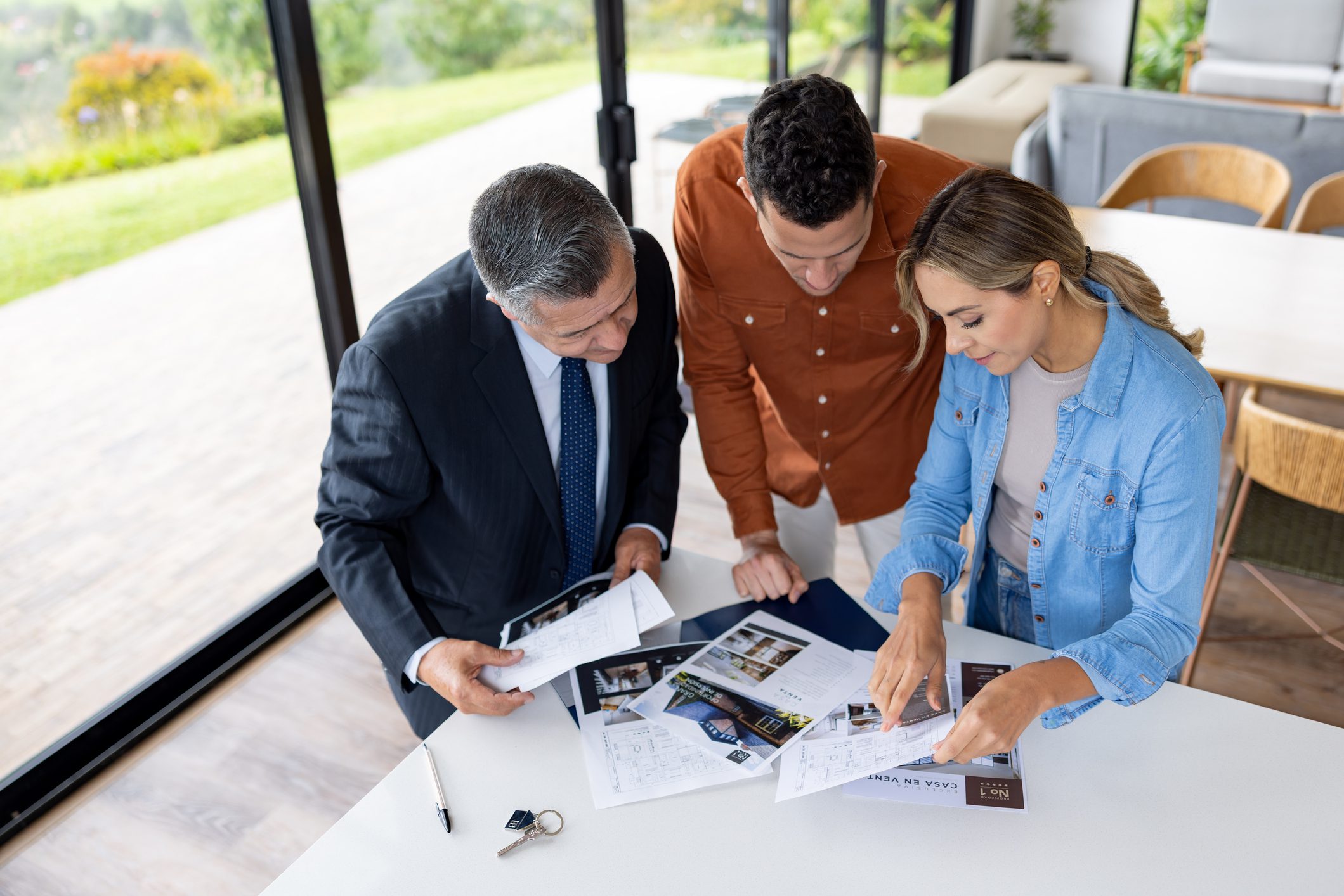 Real estate agents reviewing property documents