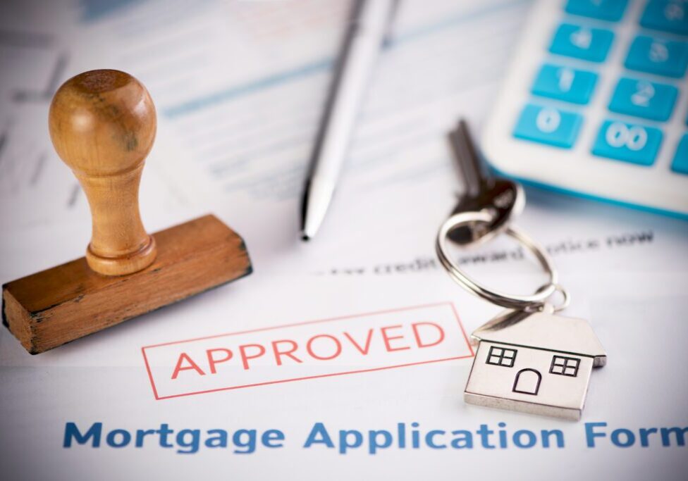 House keychain on approved mortgage form